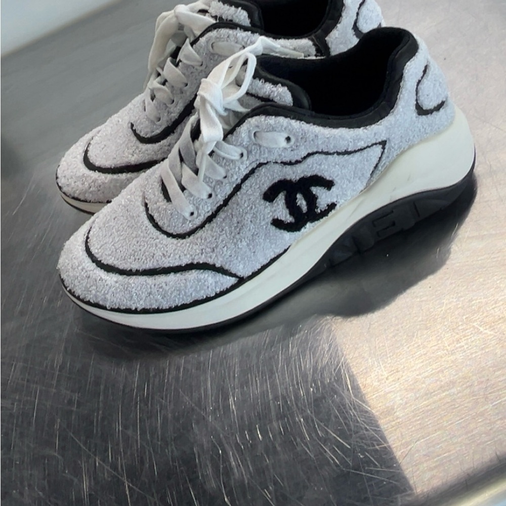 CHANEL Textured White and Black Sneakers